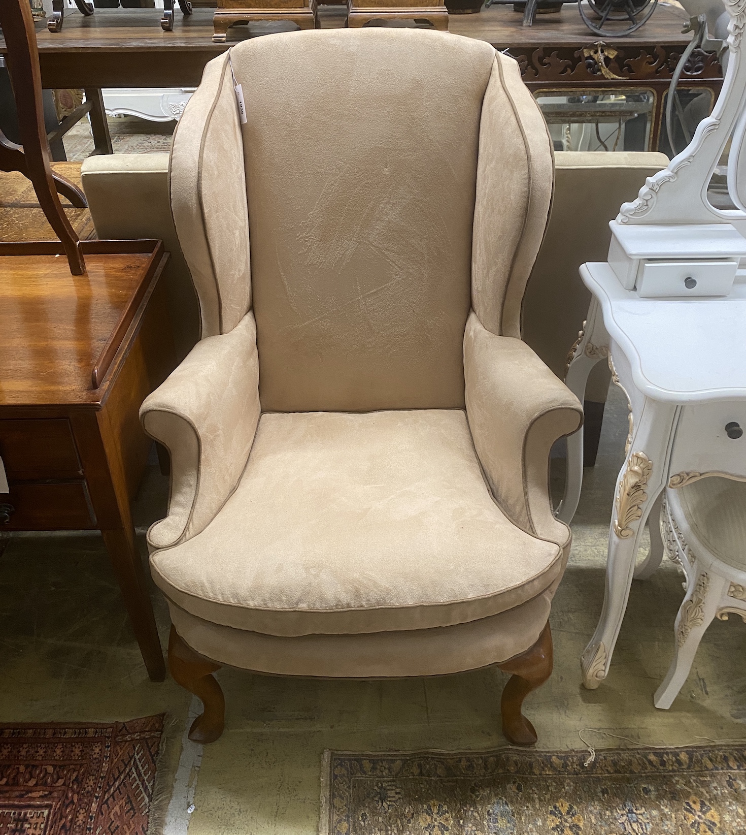 A George I style wing armchair upholstered in faux suede fabric, width 78cm, depth 70cm, height 118cm
